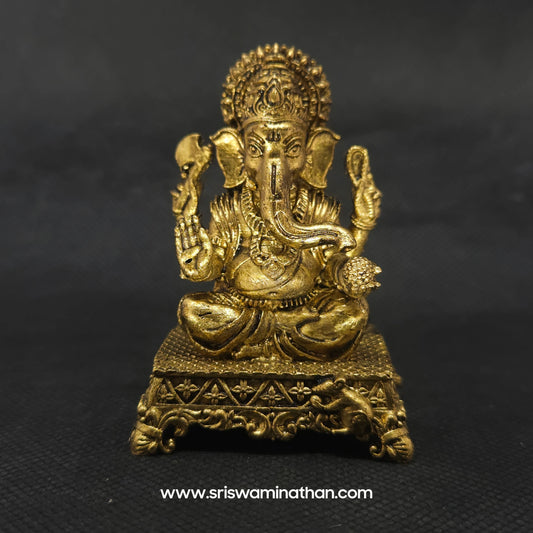 Ganesha on Carved Throne