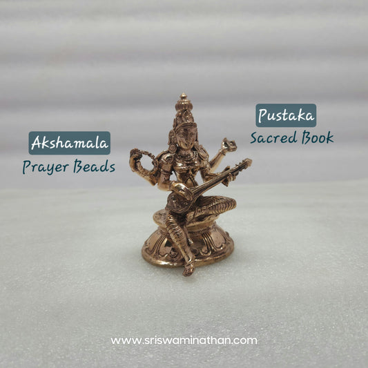 Side view of 3.5 inch Saraswati Panchaloha Statue showing four hands (Chaturbhuja) and lotus throne detail — Kumbakonam handcrafted
