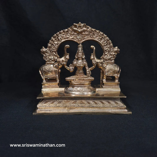 Gajalakshmi Panchaloha Statue 6 Inch front view — Gaja Abhisheka with Makara Torana arch, handcrafted in Kumbakonam by Sri Swaminathan & Co
